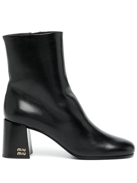 miu miu black leather ankle boots|Farfetch miu mitu boots.